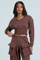 NIA CORSETED ZIPPERED LONGSLEEVE SWEATSHIRT
