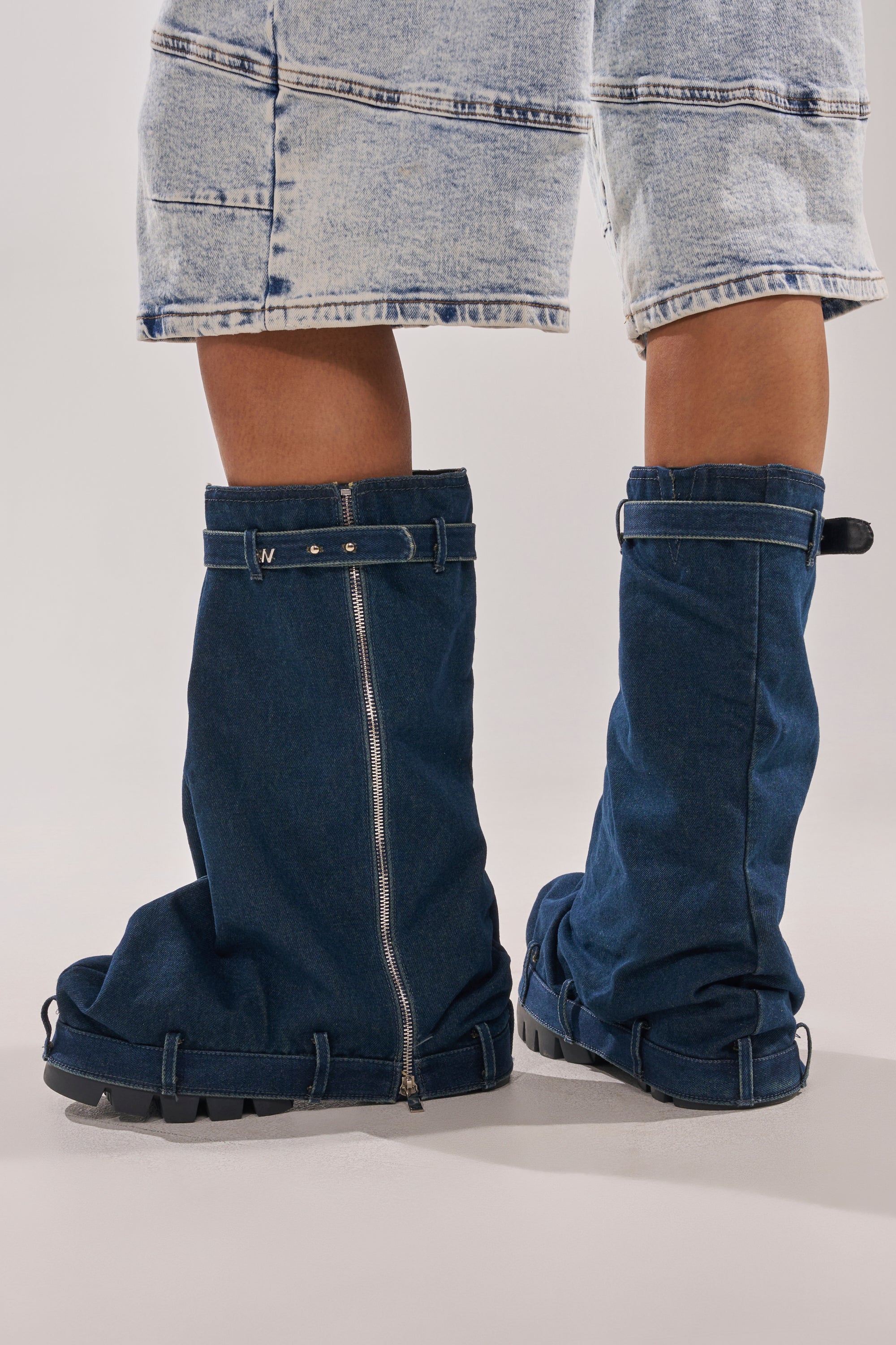 AKIRA GOLD ANGELA FOLD OVER PLATFORM BOOT IN DARK DENIM